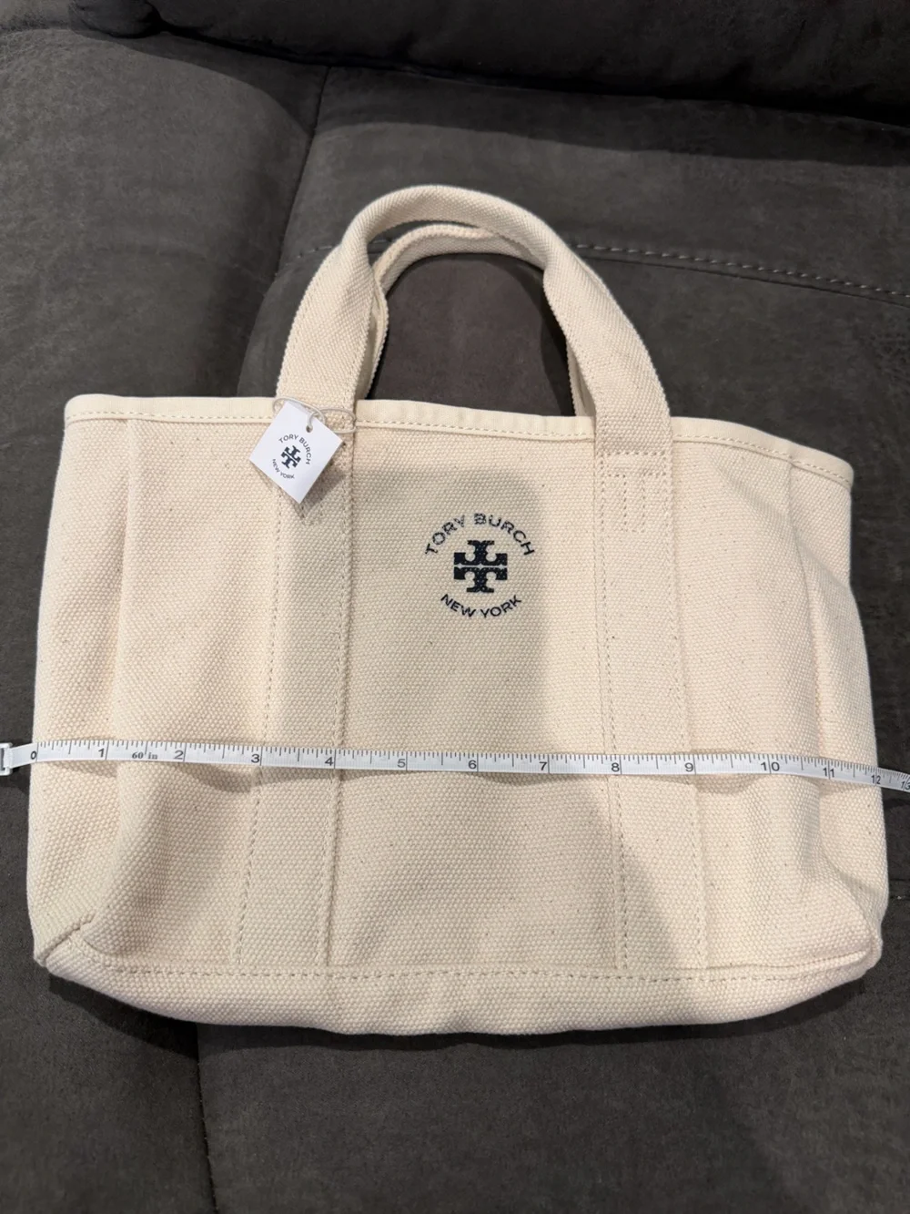 New Tory Burch Cream Canvas Duffel Tote with Navy Logo 12inch by 8inch